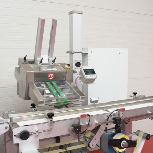 Etipack Whizzy SM stepper motor friction feeder on a production line