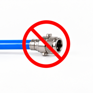 Pneumatic air line connector with a red prohibition symbol, representing airless labelling and coding equipment
