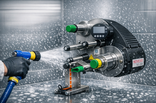 Washdown labeller with IP65 protection showing spray hose