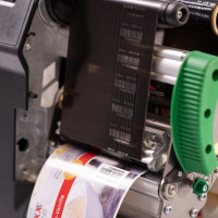 Novexx XLP 60x printer showing ribbon-save